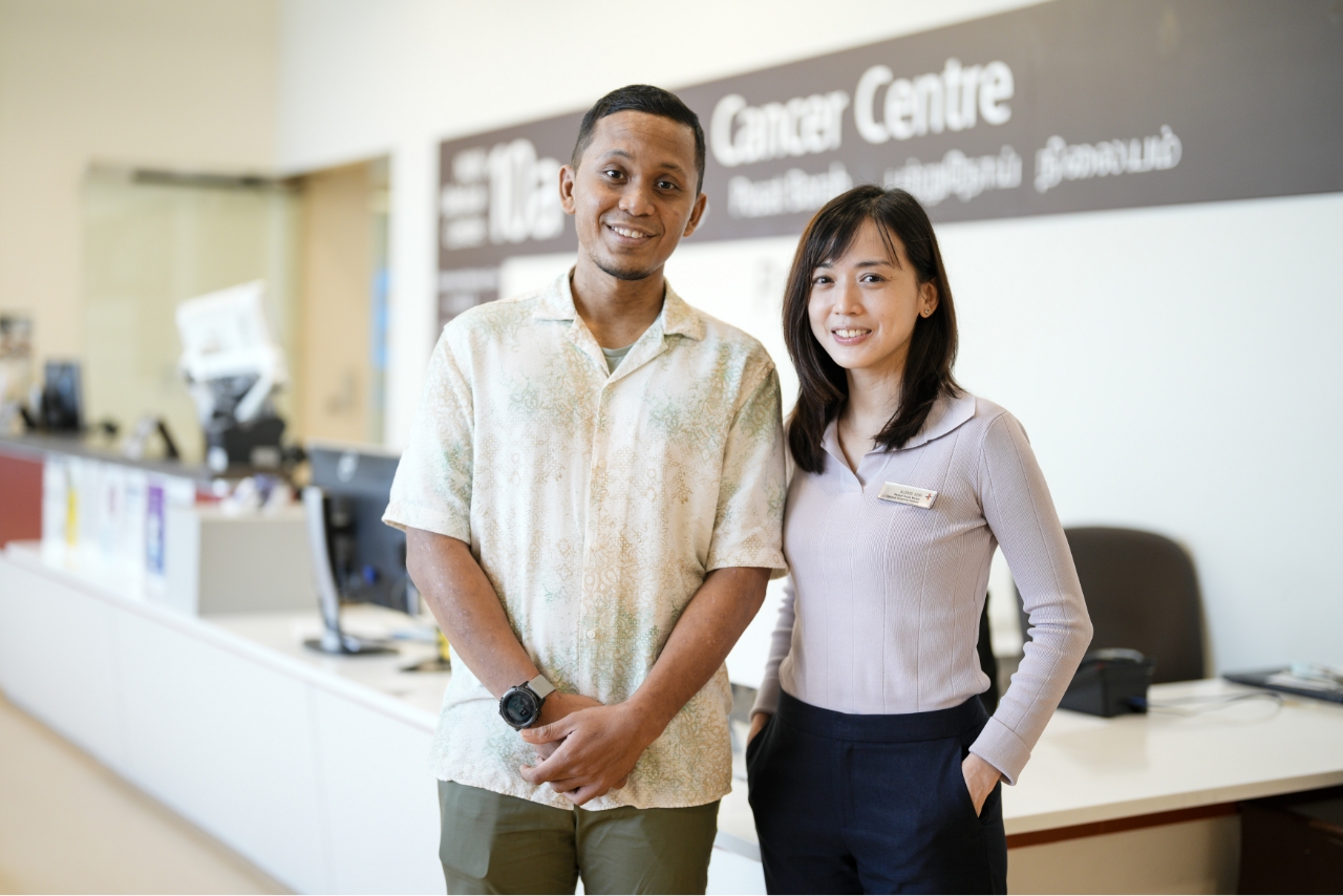 Mr Abdul Rashid (left) , with Ms Alexis Koh, a Principal Medical Social Worker at NUH, who helped him mobilise various channels to cope with his treatment costs. 